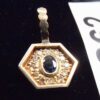 1960s .21 Ct. Oval Sapphire Pendant with 12 Diamonds in Yellow Gold Mounting