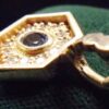 1960s .21 Ct. Oval Sapphire Pendant with 12 Diamonds in Yellow Gold Mounting - Image 4