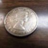 1964 Canada Silver Dollar with Extra British, Canadian, German, and Belgian Coin - Image 3